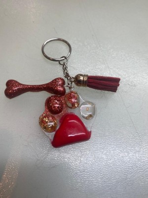 Sleutelhanger met hondenpoot, hondebot